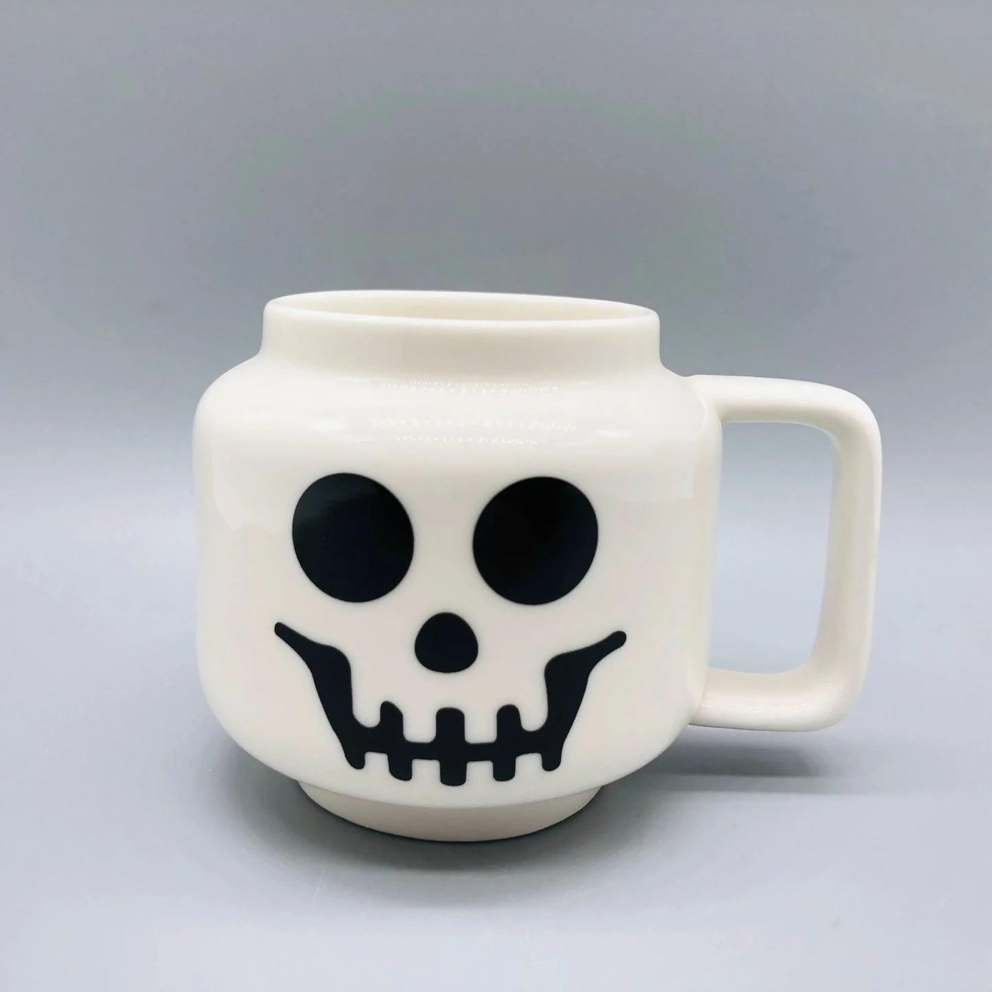 SIPSI LEGO™ Ceramic Mug, White Skeleton, Silly boy, iconic boy, happy boy, winking Girl